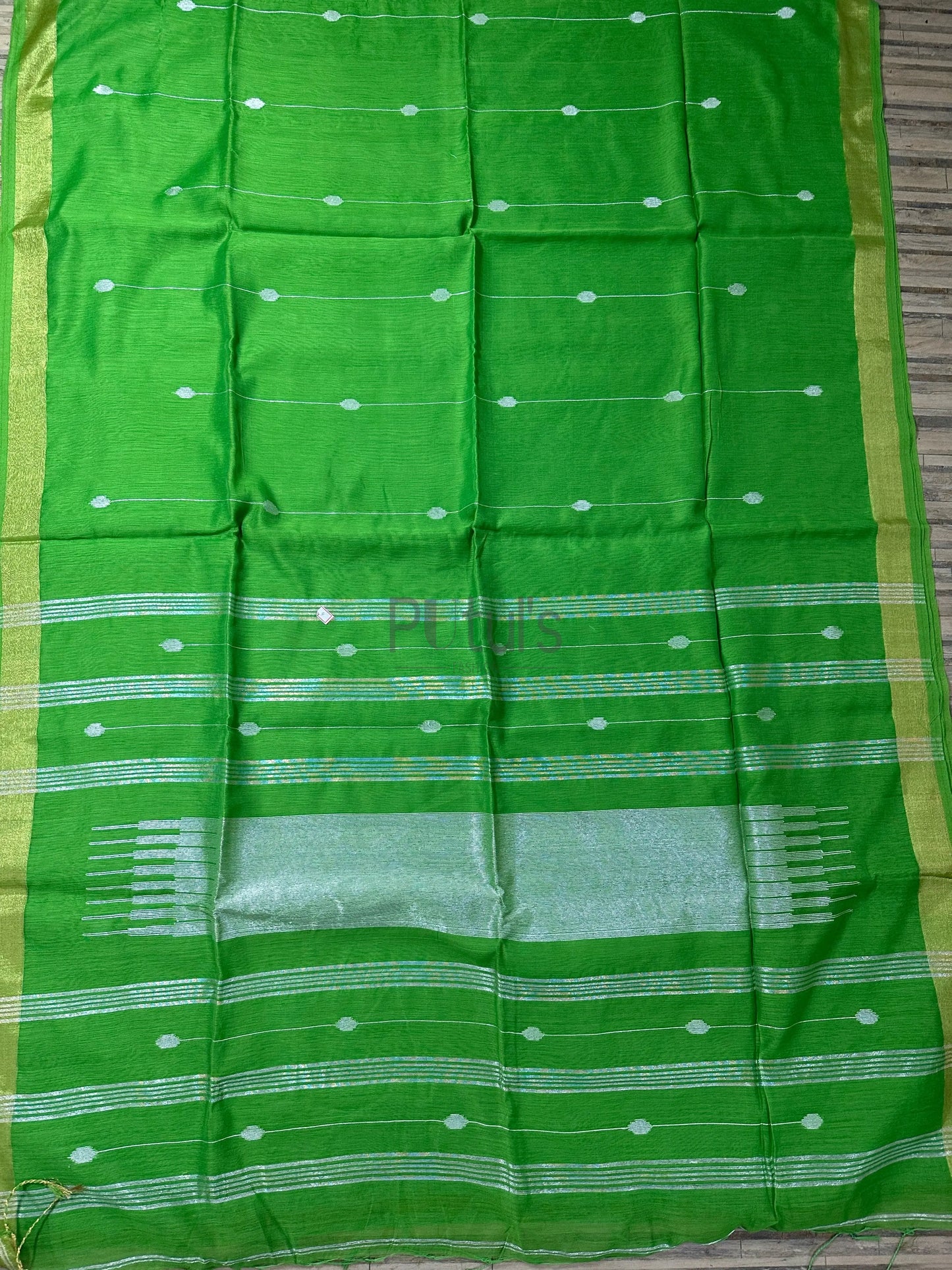 Sweet mystic green coloured handloom saree Putul's Fashion
