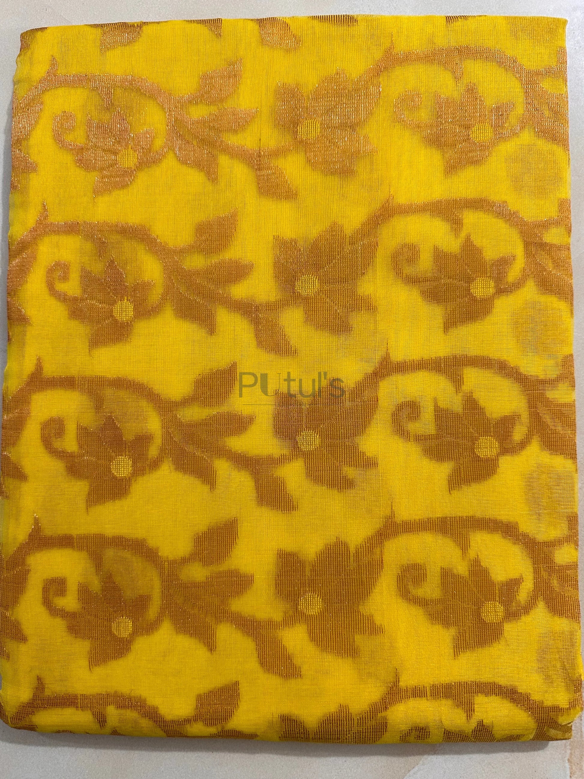Yellow coloured Muslin saree of golden meenakari work Putul's Fashion