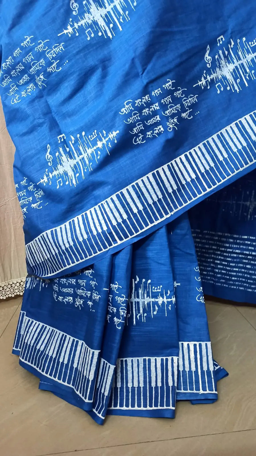 Bengali script on saree Putul's fashion