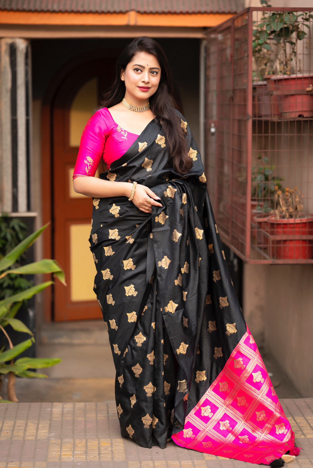 Black coloured Soft silk woven saree