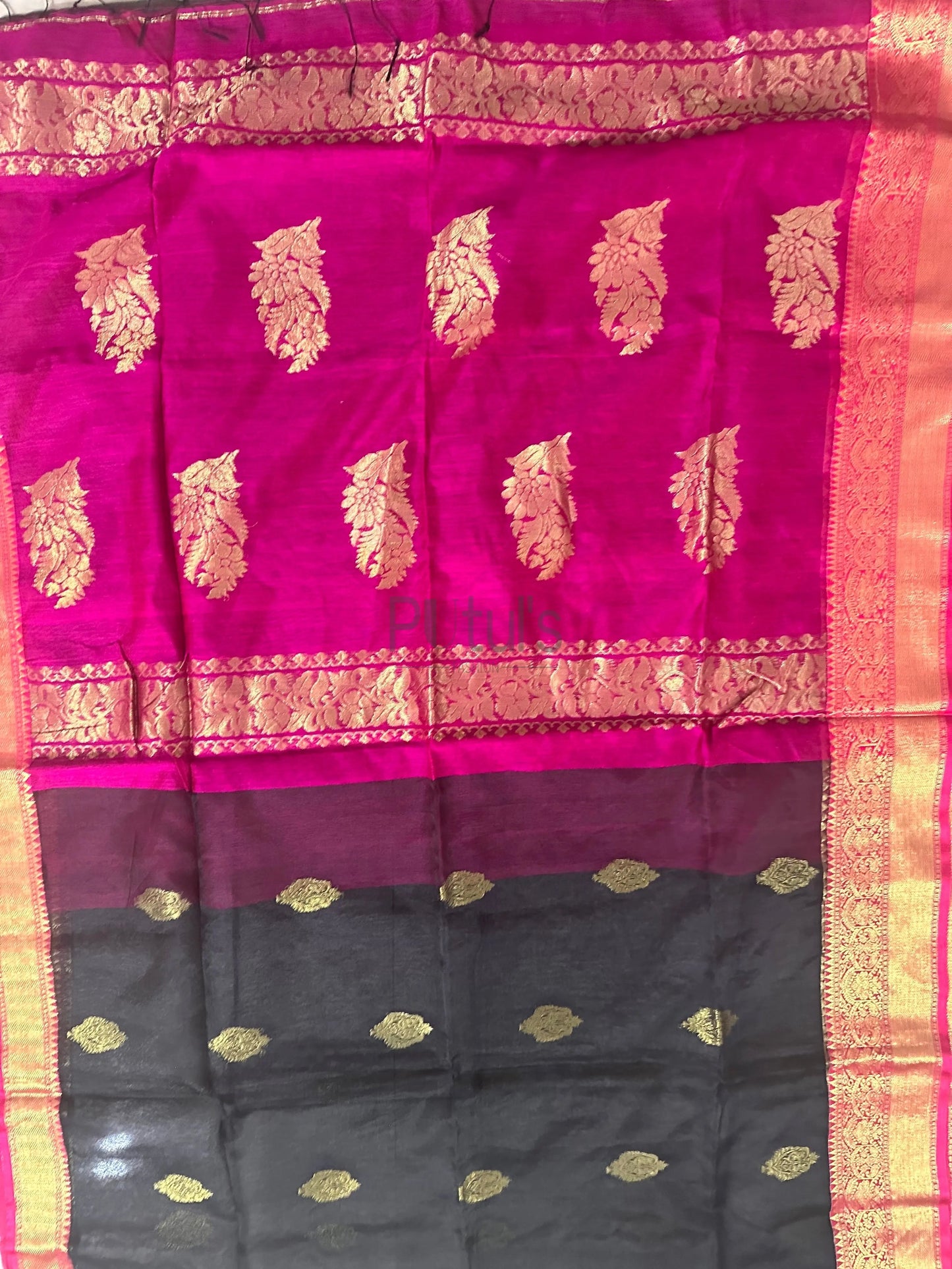 Black muslin banarasi saree of golden zari work Putul's Fashion