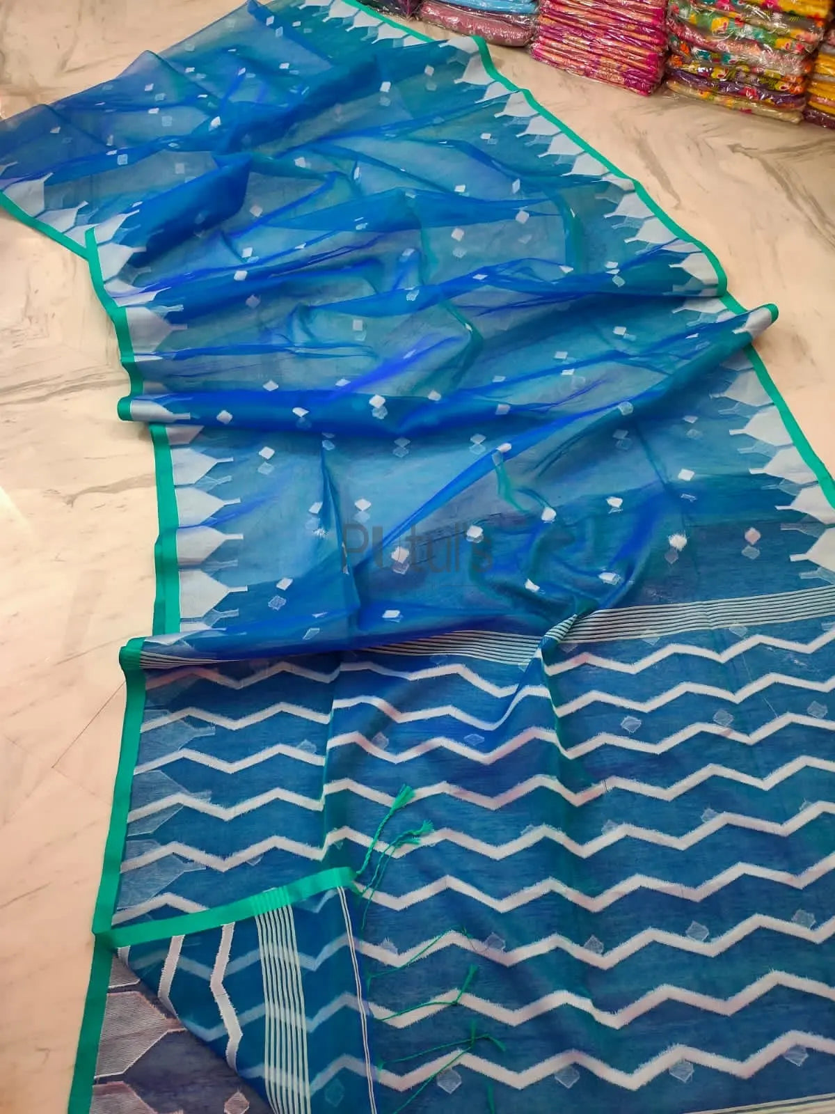 Handwoven temple border Muslin saree Putul's Fashion
