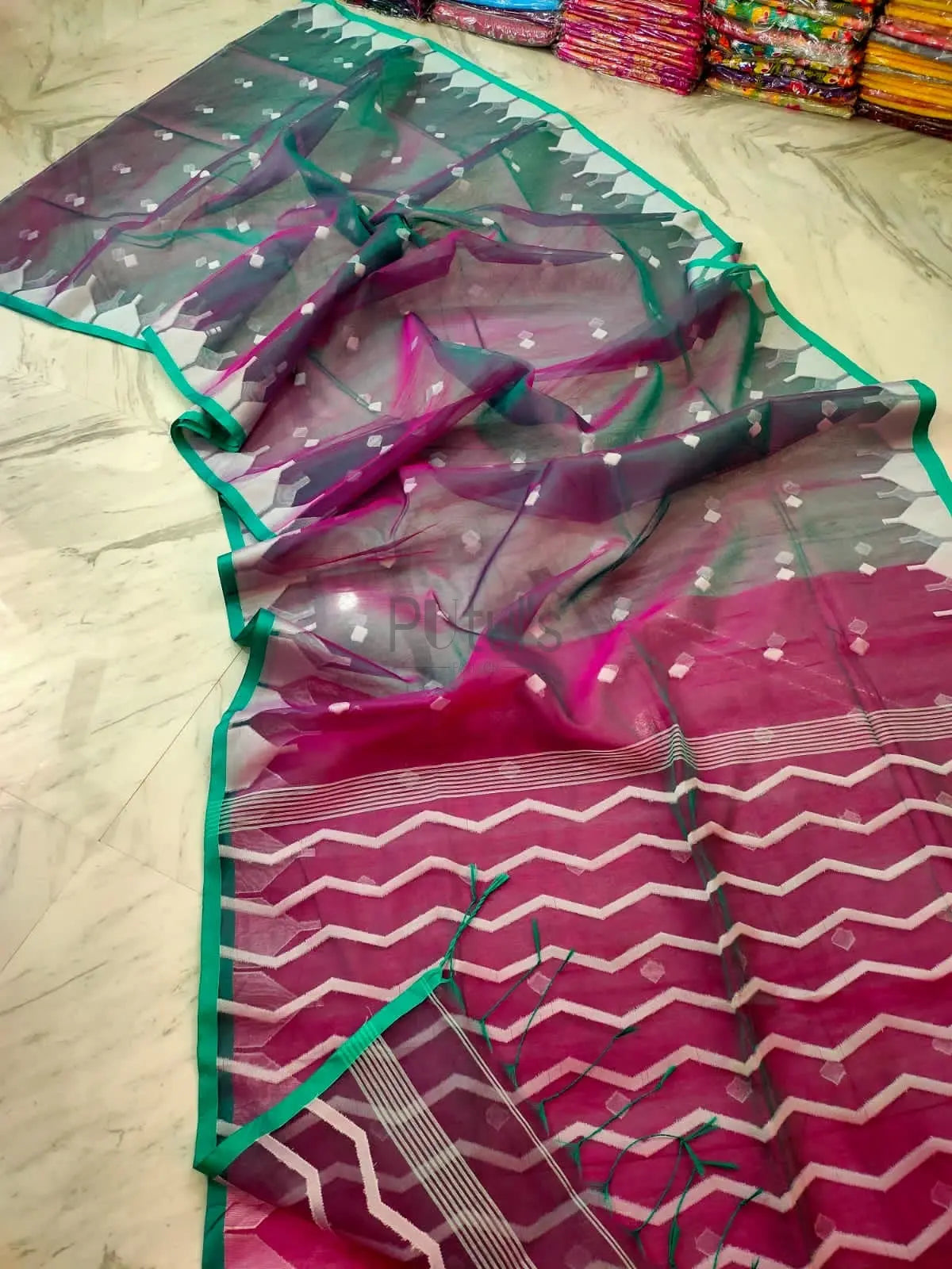 Handwoven temple border Muslin saree Putul's Fashion