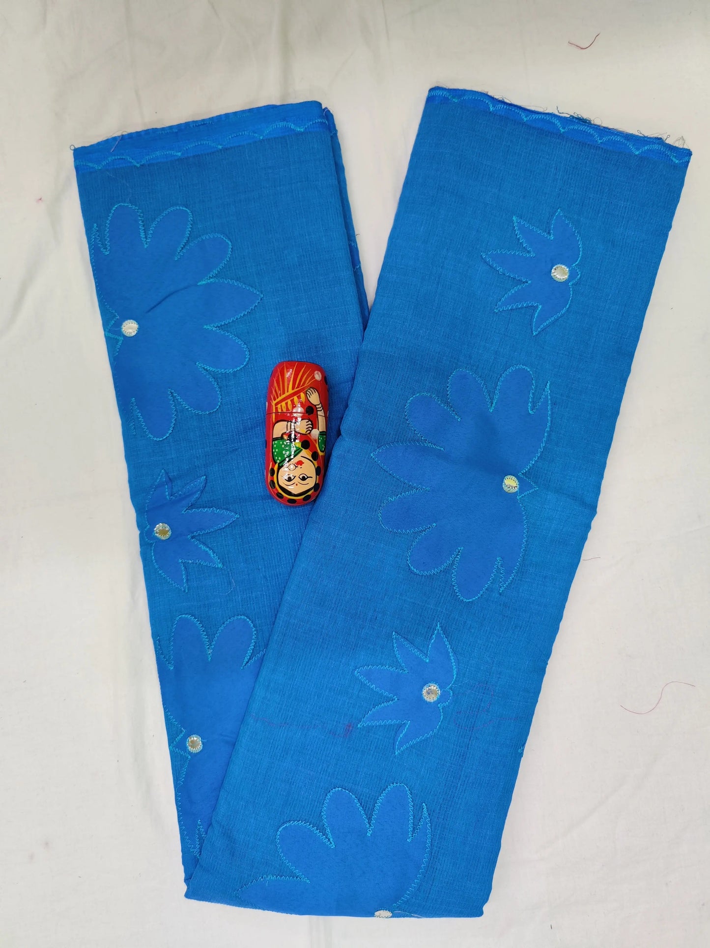 Applique saree noyel silk blue colour mirror work