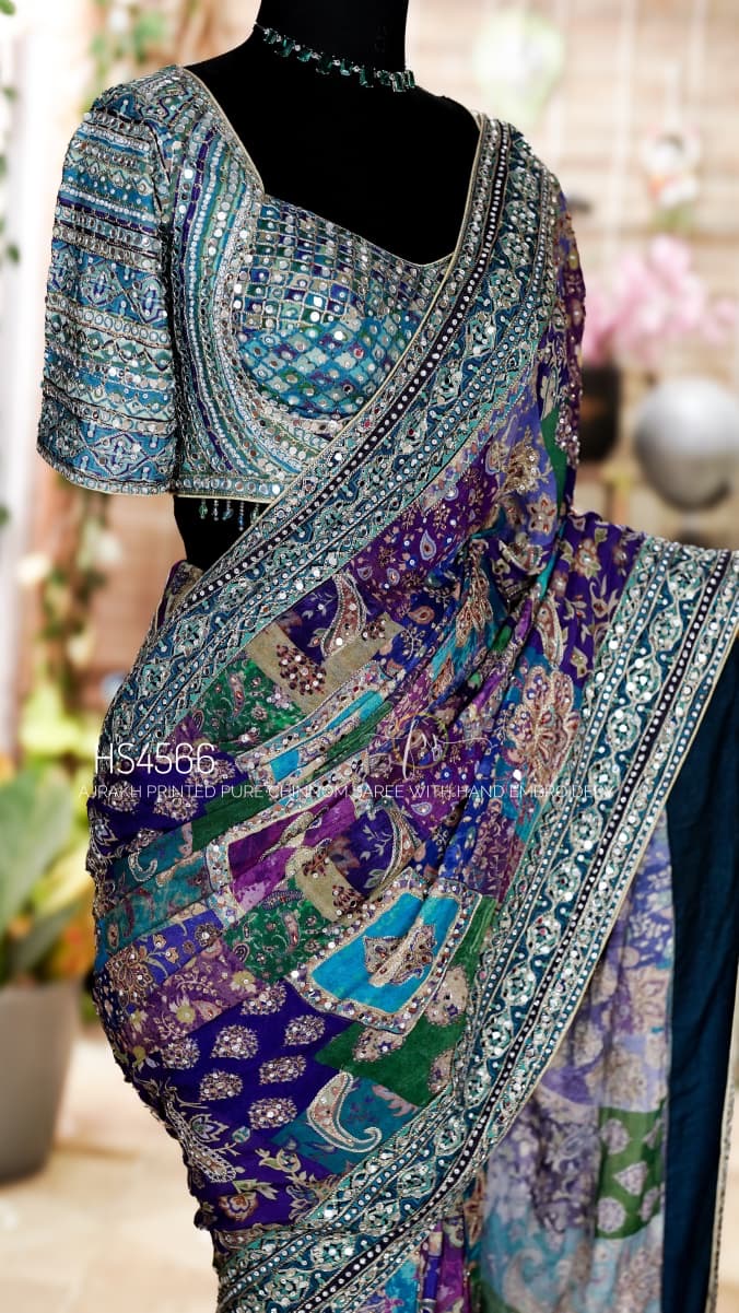Putuls Fashion Celebrity Style Chinnon Designer Saree in Purple and Teal