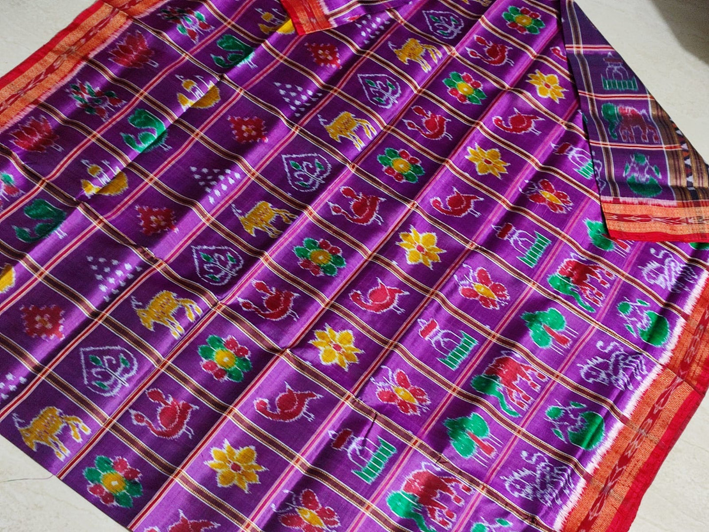 Putuls Fashion Sambalpuri Handloom Double Ikkat Saree in Purple and Red