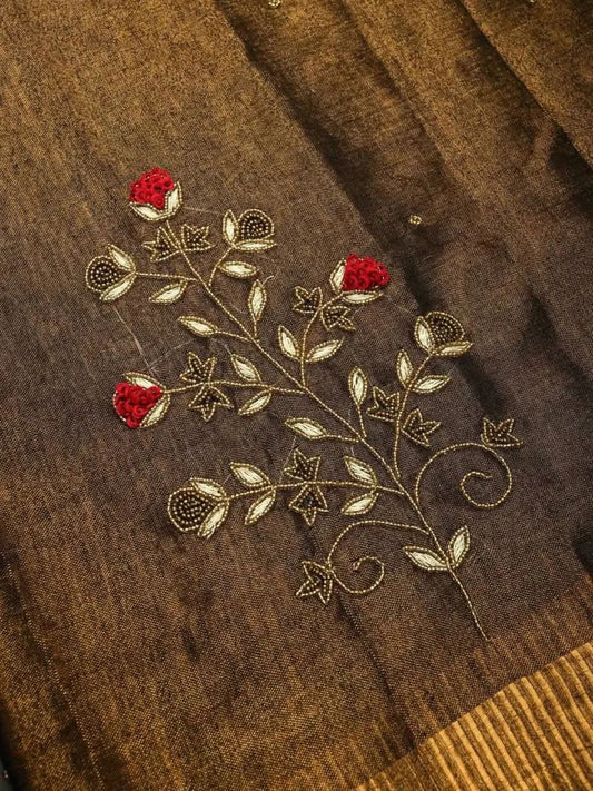 Elegant tissue Linen Jamdani Saree with hand French embroidery work from Putul's Fashion Collection
