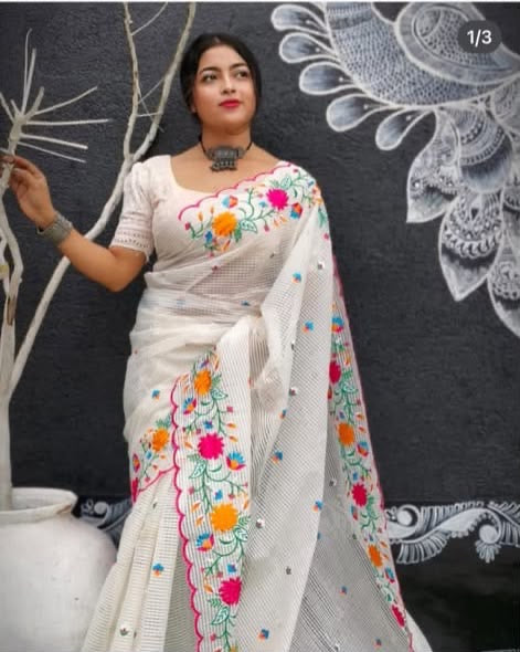 White reshom kota embroidery saree from Bengal