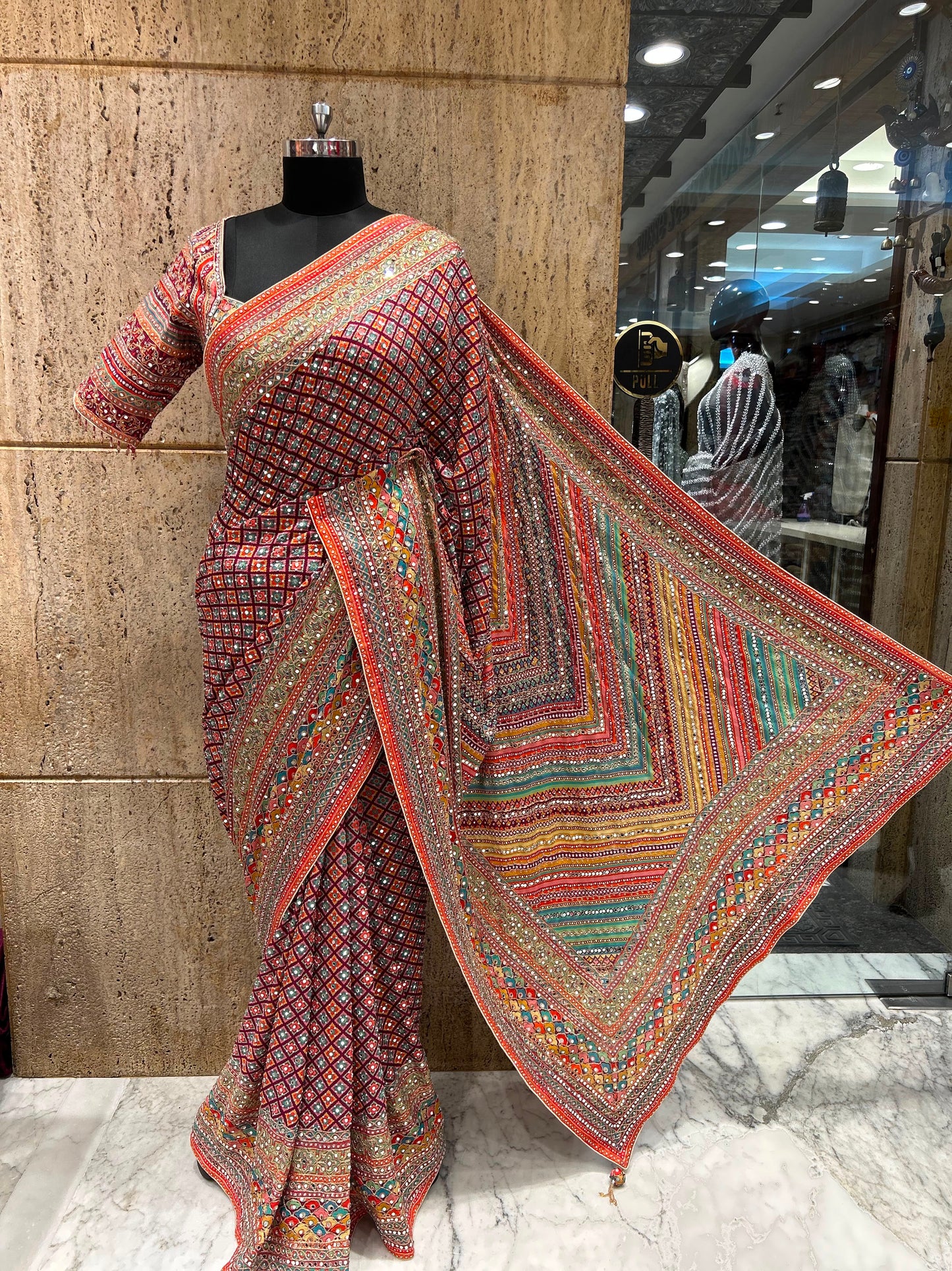 Trending viral Chinnon saree , Ajrakh with mirror work and antique stones with stitched blouse
