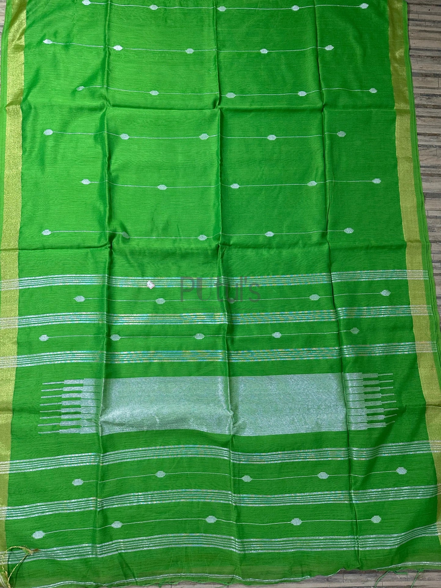 Sweet mystic green coloured handloom saree Putul's Fashion