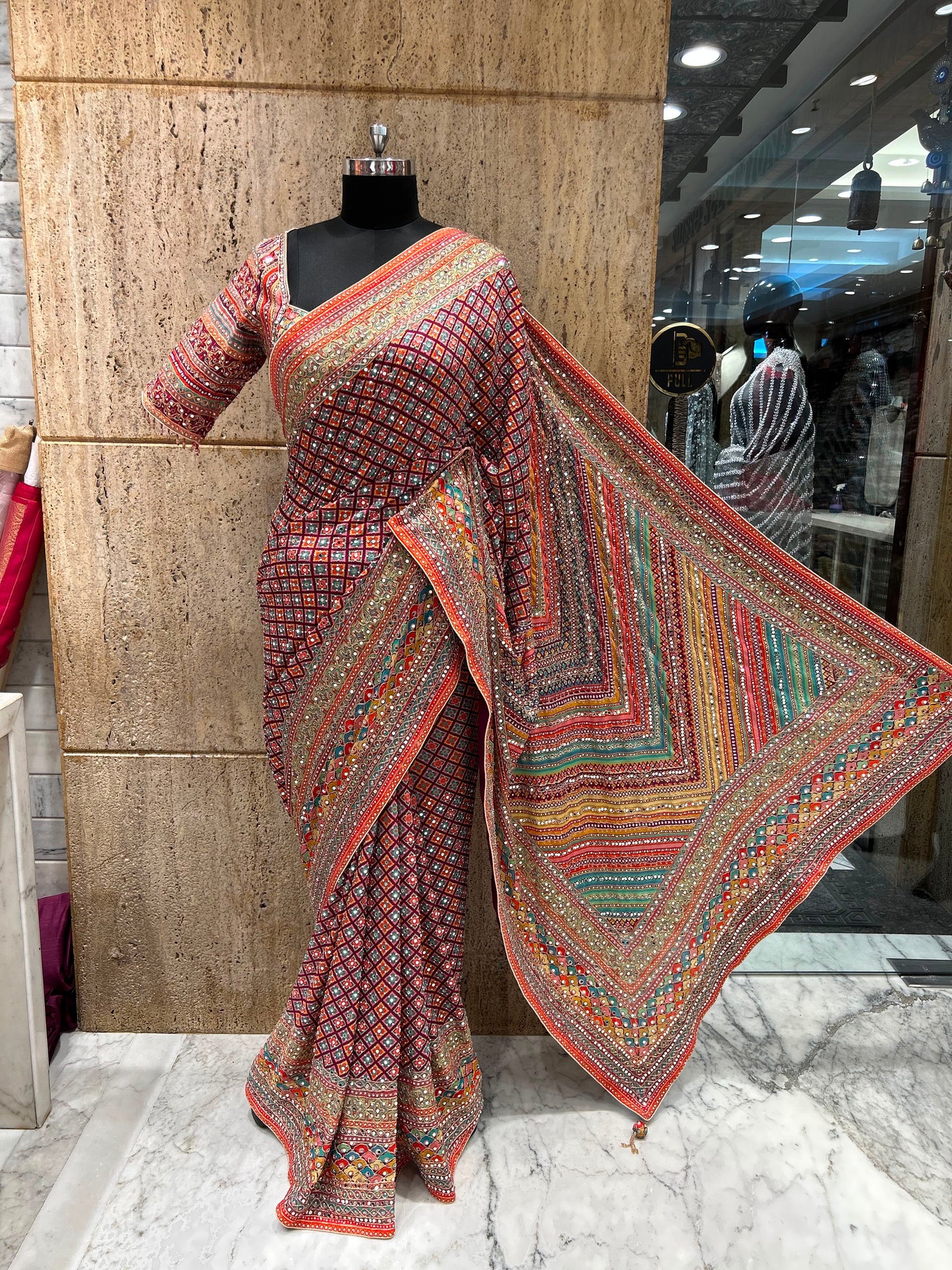 Trending viral Chinnon saree , Ajrakh with mirror work and antique stones with stitched blouse