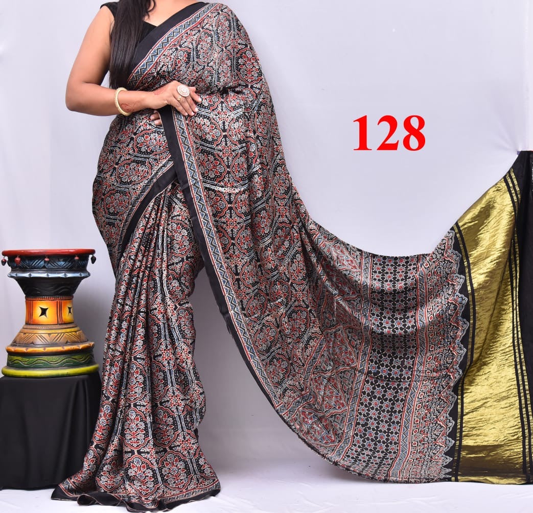 Natural dyed Modal silk saree with ajrakh print and lagdi patta on pallu