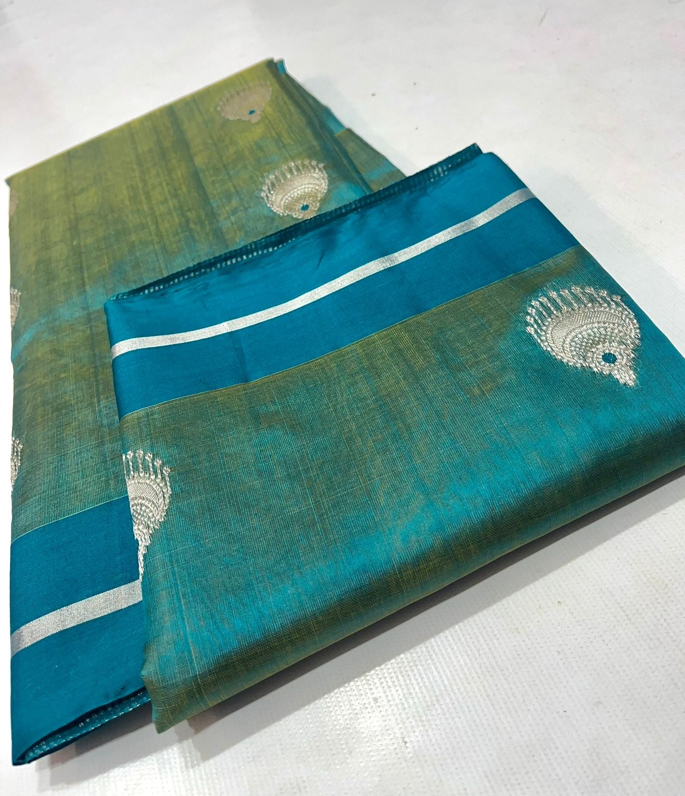 Dual tone firoza  Pattu Tissue Saree from Putul's Fashion