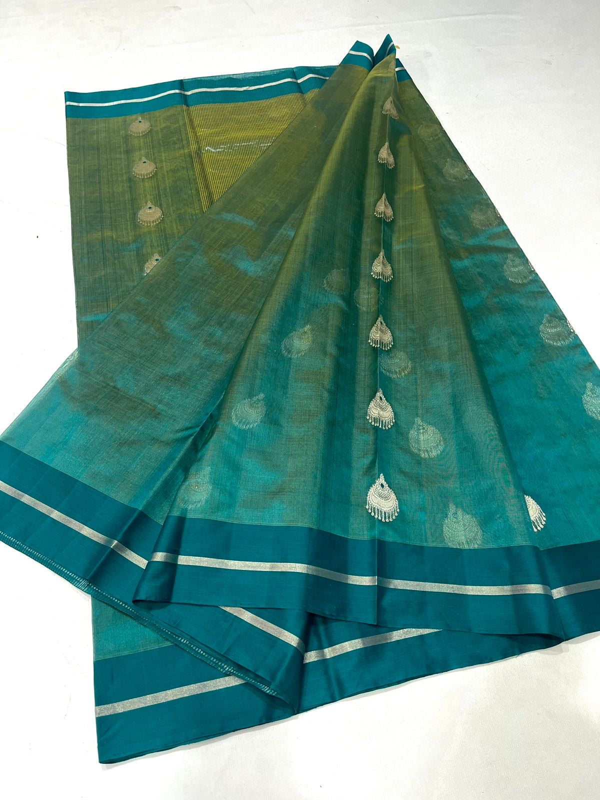 Dual tone firoza  Pattu Tissue Saree from Putul's Fashion