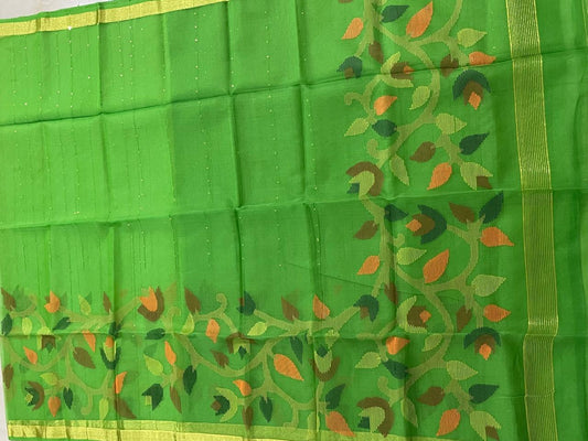 Green coloured muslin saree with blouse and handweaving work