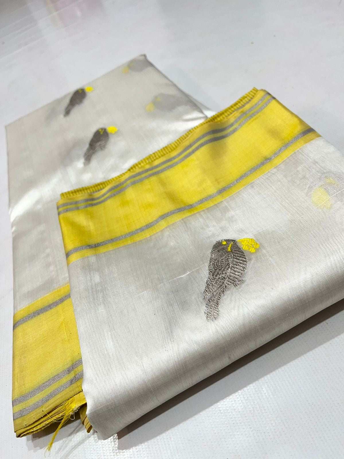 South Pattu tissue saree A saree of legacy yellow border with rich weaving of bird - Silver white - Pattu saree