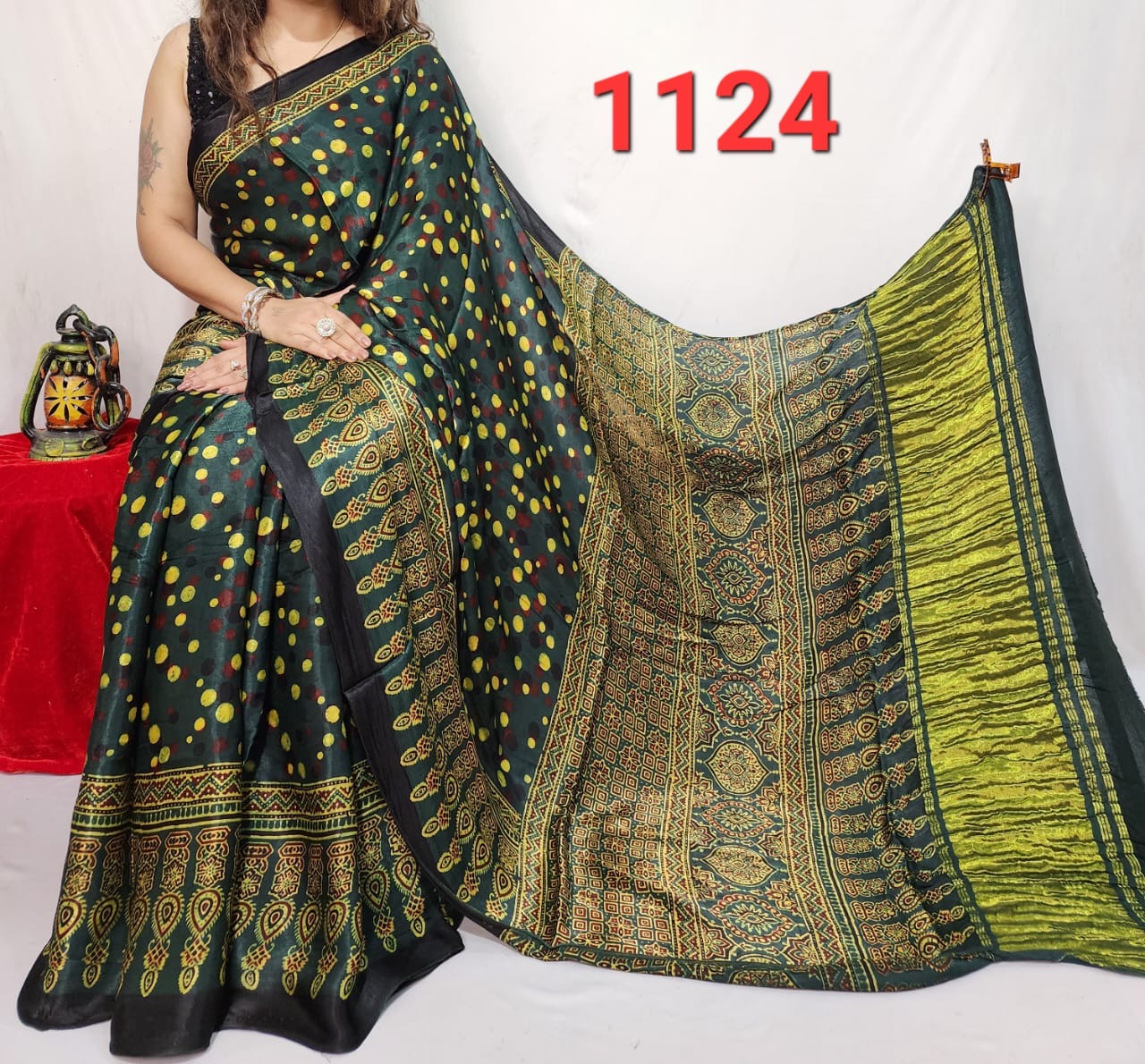 Natural dyed Modal silk saree with ajrakh print and lagdi patta on pallu