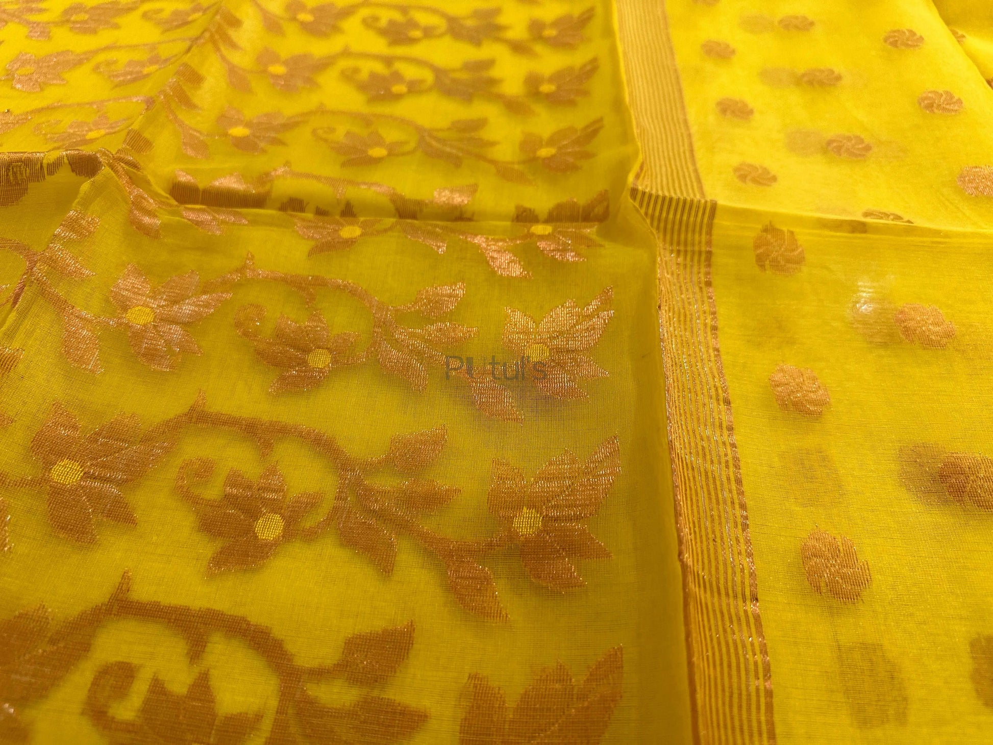 Yellow coloured Muslin saree of golden meenakari work Putul's Fashion