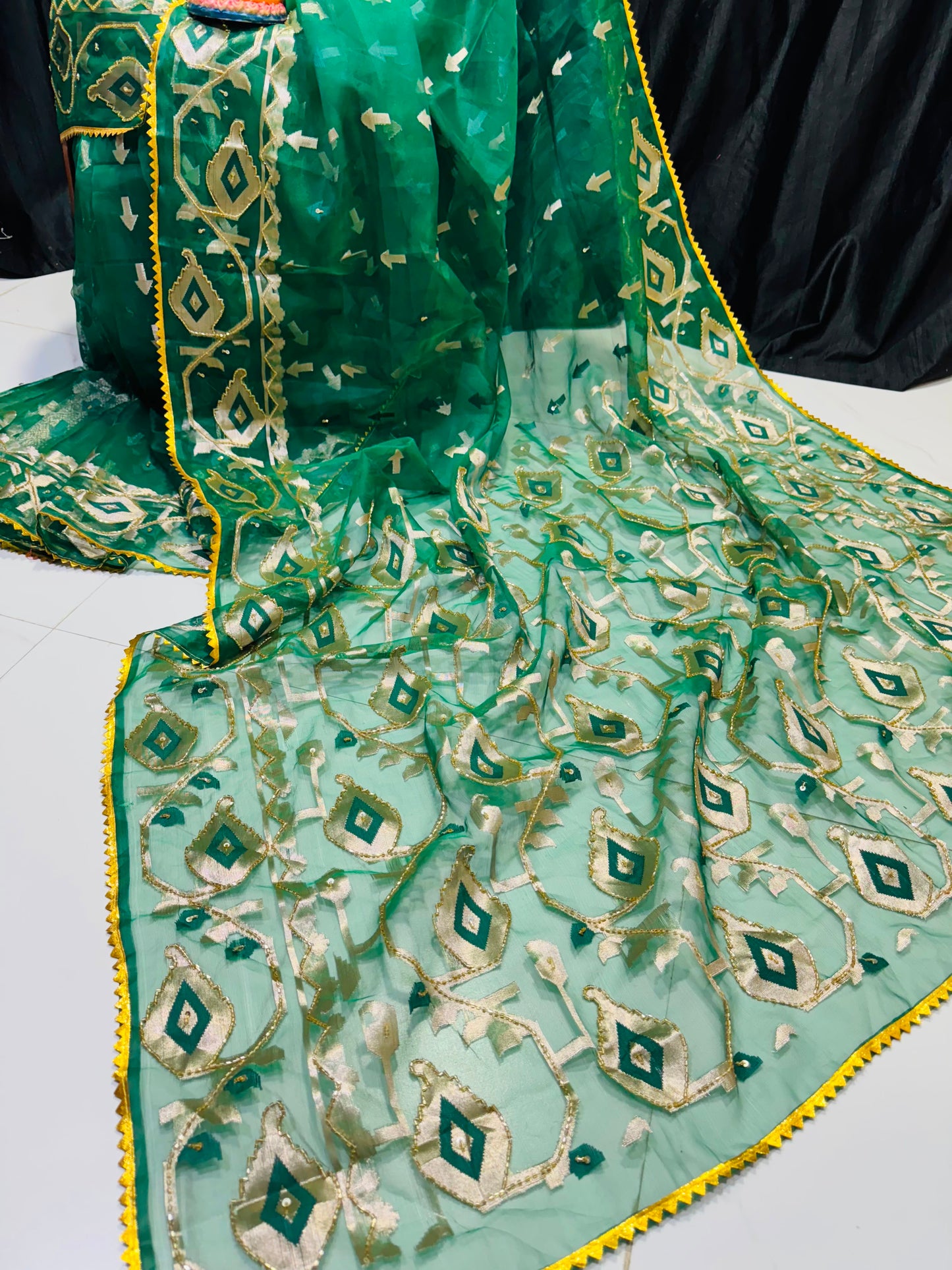 Kardana work on muslin jamdani saree