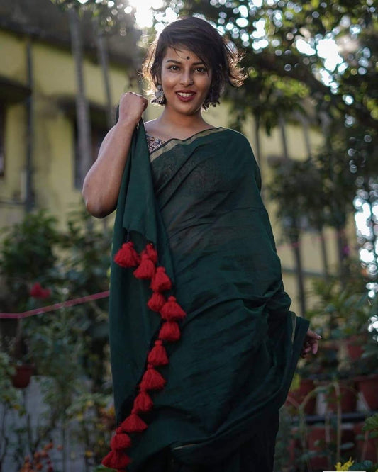 Bottle green cotton saree zari border and red tassel