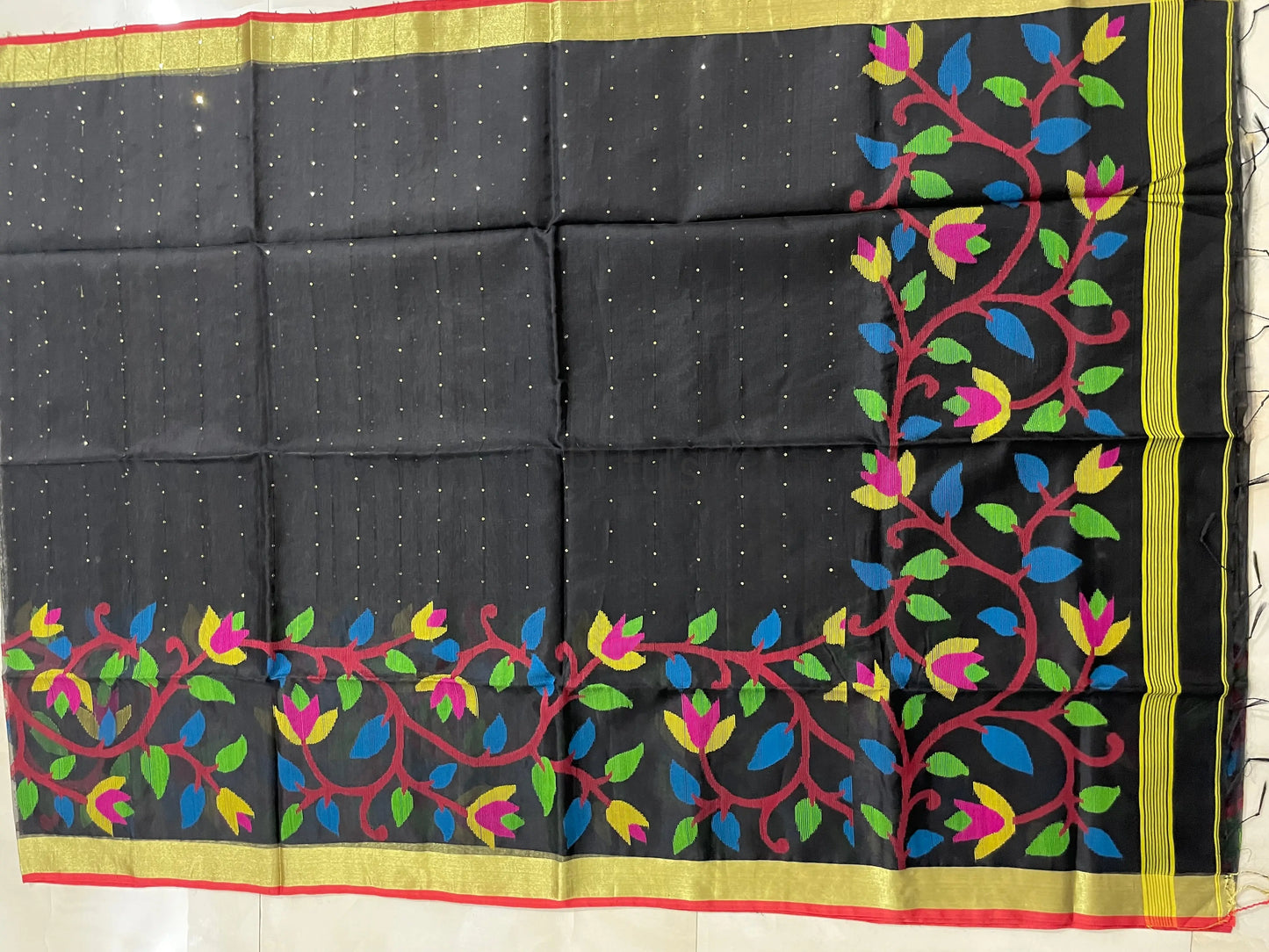 Coal black Muslin jamdani saree with blouse and handweaving work Putul's Fashion