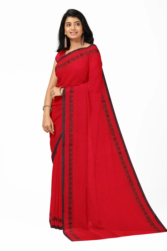 A red khadi cotton saree with a traditional love weaving pattern on the border. The saree is made of 100% cotton and is soft and comfortable to wear. The love weaving pattern is a beautiful and intricate design that adds a touch of elegance to the saree.: Putul's fashion