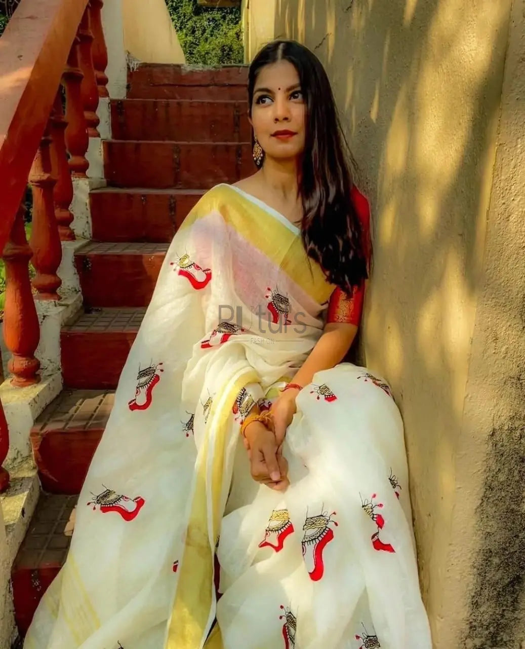 Linen saree with imprints of power and divinity Putul's Fashion