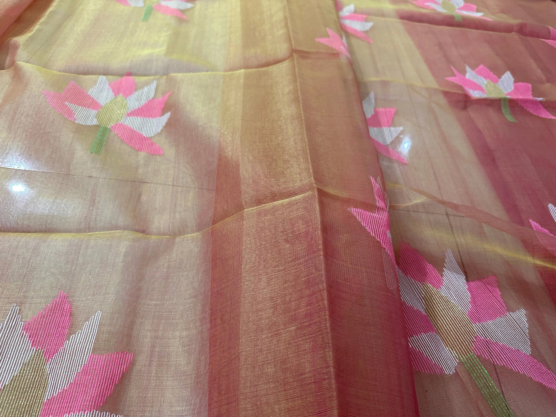 Peach coloured dual tone hand weaving Bengal Muslin saree of handweaving lotus Putul's Fashion