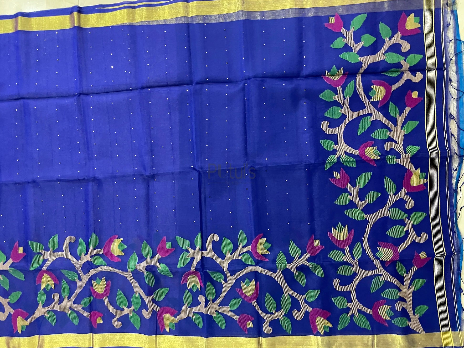 Royal blue Muslin jamdani saree with blouse and handweaving work Putul's Fashion