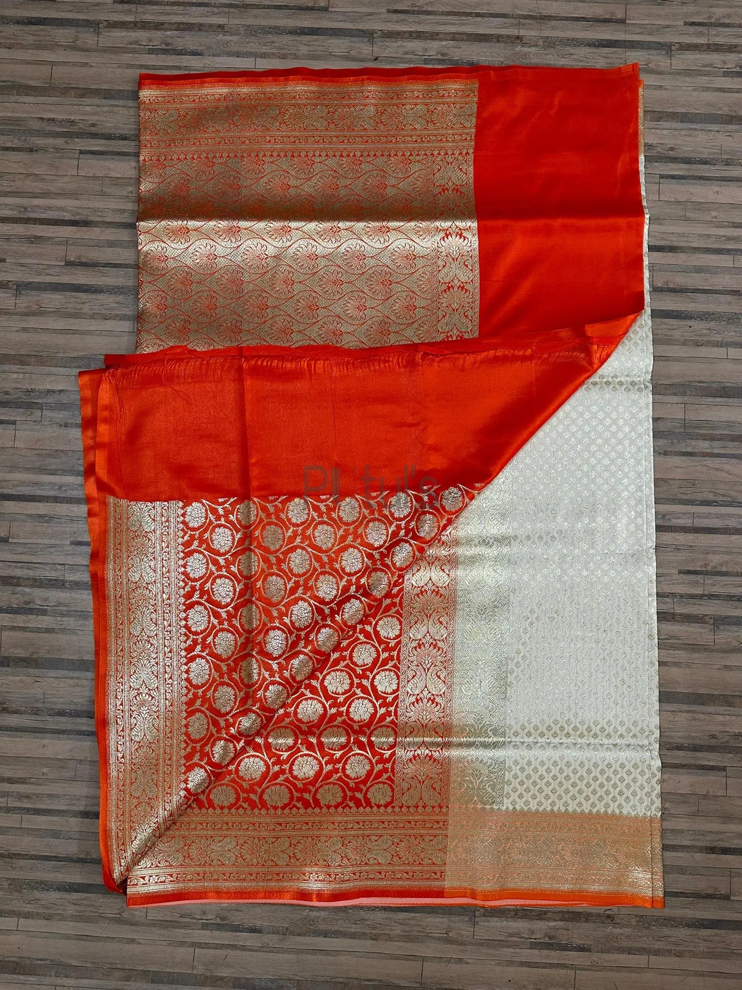 Banarasi katan silk white orange Putul's Fashion