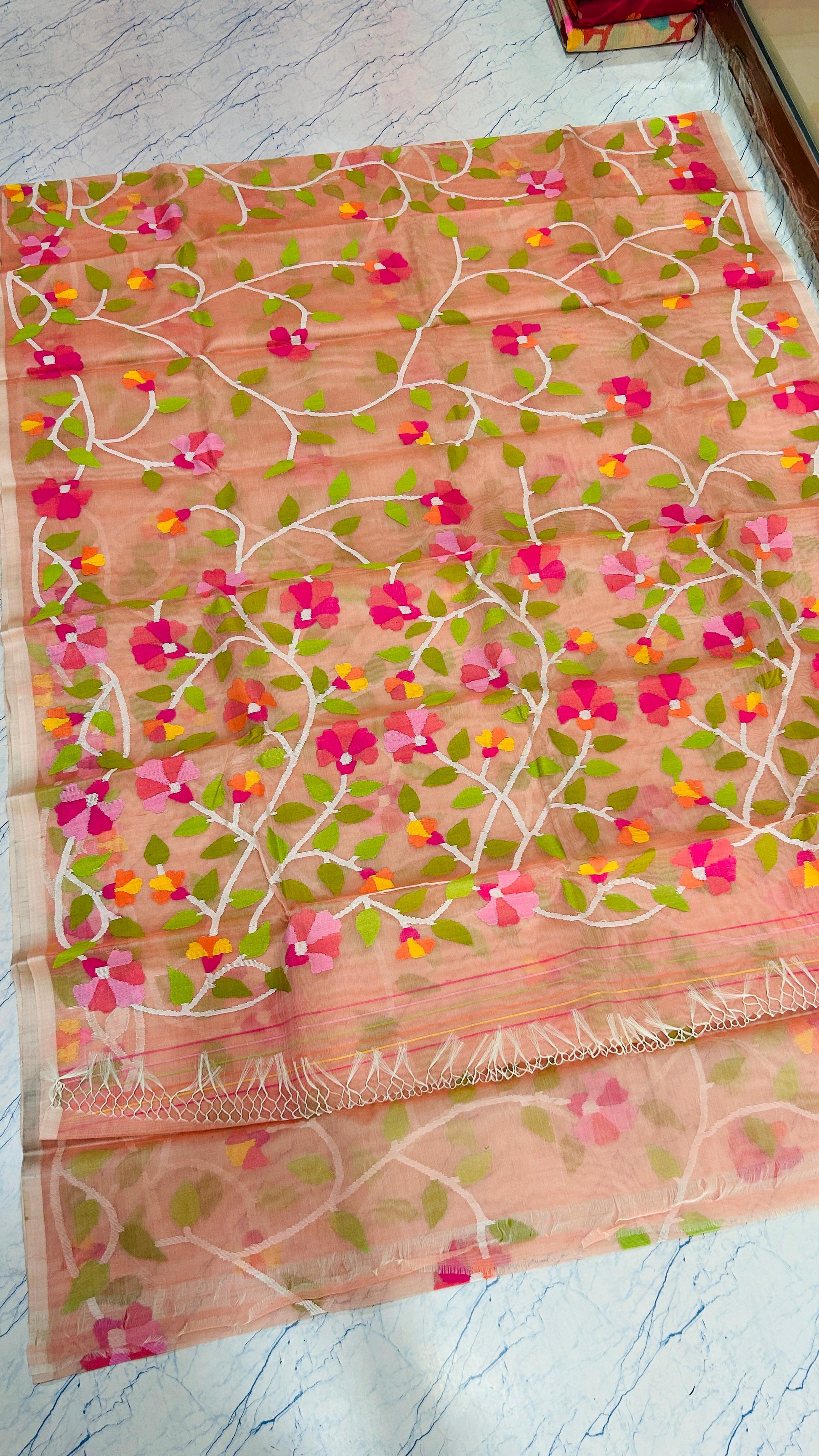 Peach Floral Muslin Jamdani Saree by Putul’s Fashion