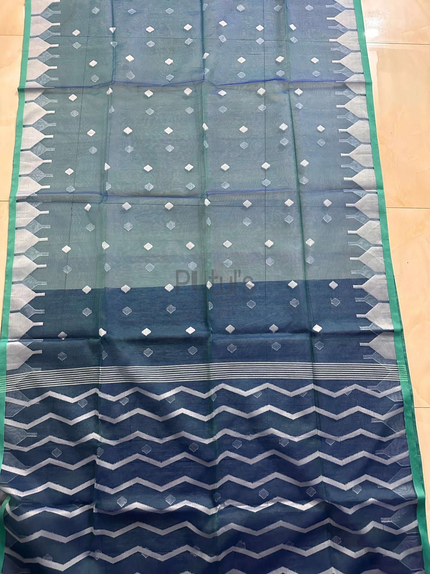 Handwoven temple border Muslin saree Putul's Fashion