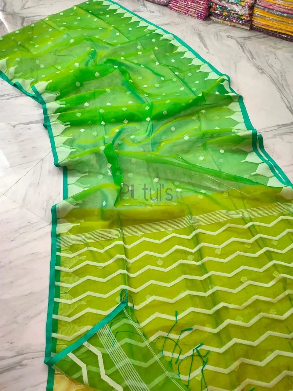 Handwoven temple border Muslin saree Putul's Fashion