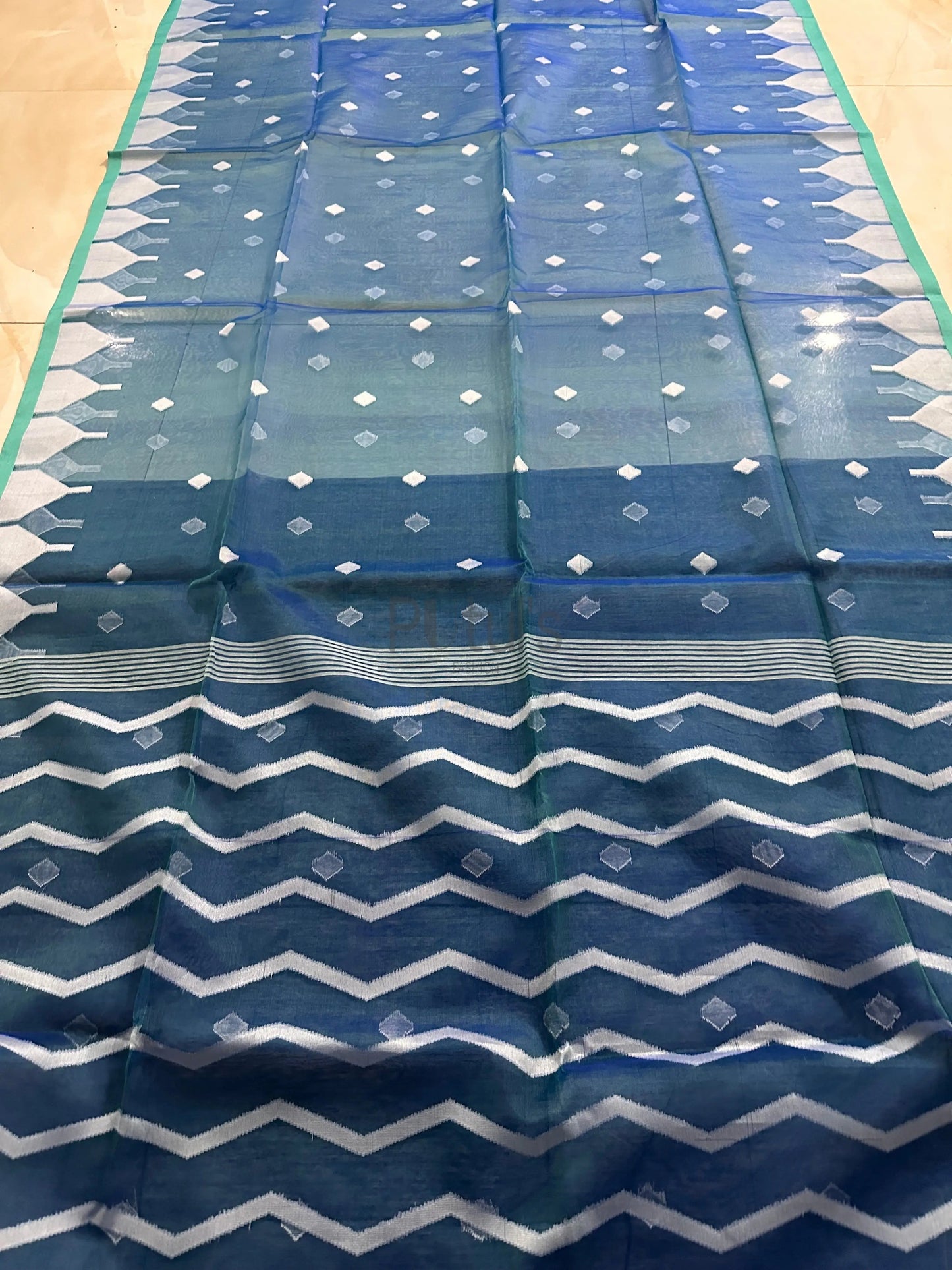 Handwoven temple border Muslin saree Putul's Fashion