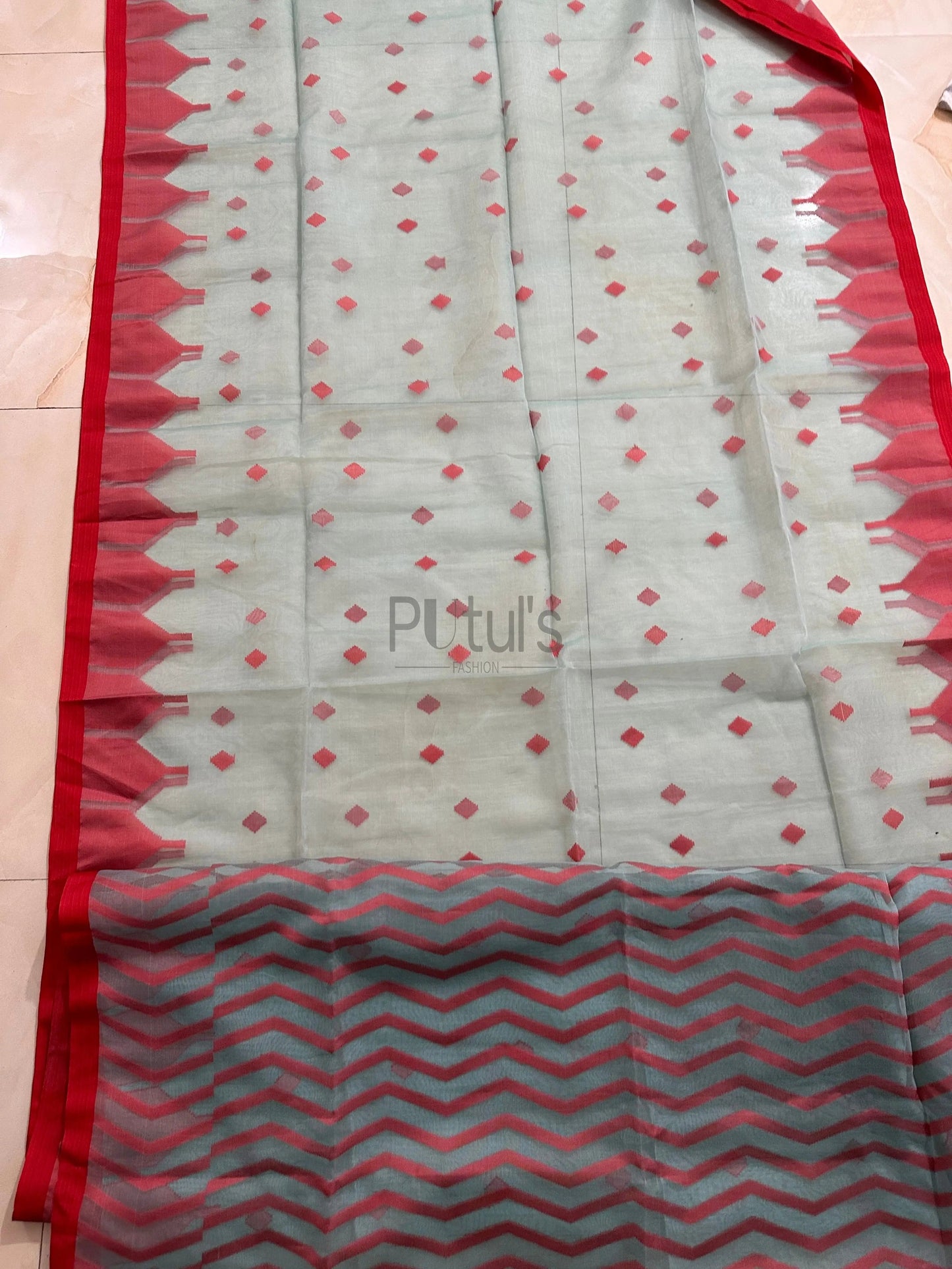 Handwoven temple border Muslin saree Putul's Fashion