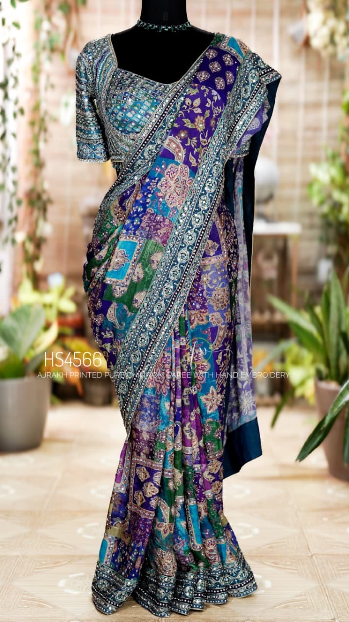 Putuls Fashion Celebrity Style Chinnon Designer Saree in Purple and Teal