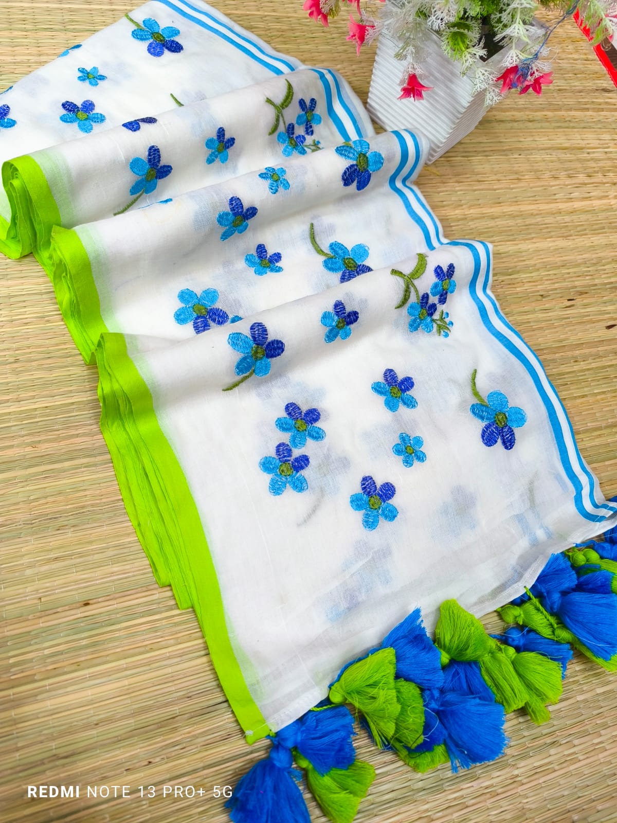Putul’s Fashion White Cotton Saree with Blue Flower Motif Weaved Embroidery - Mul cotton