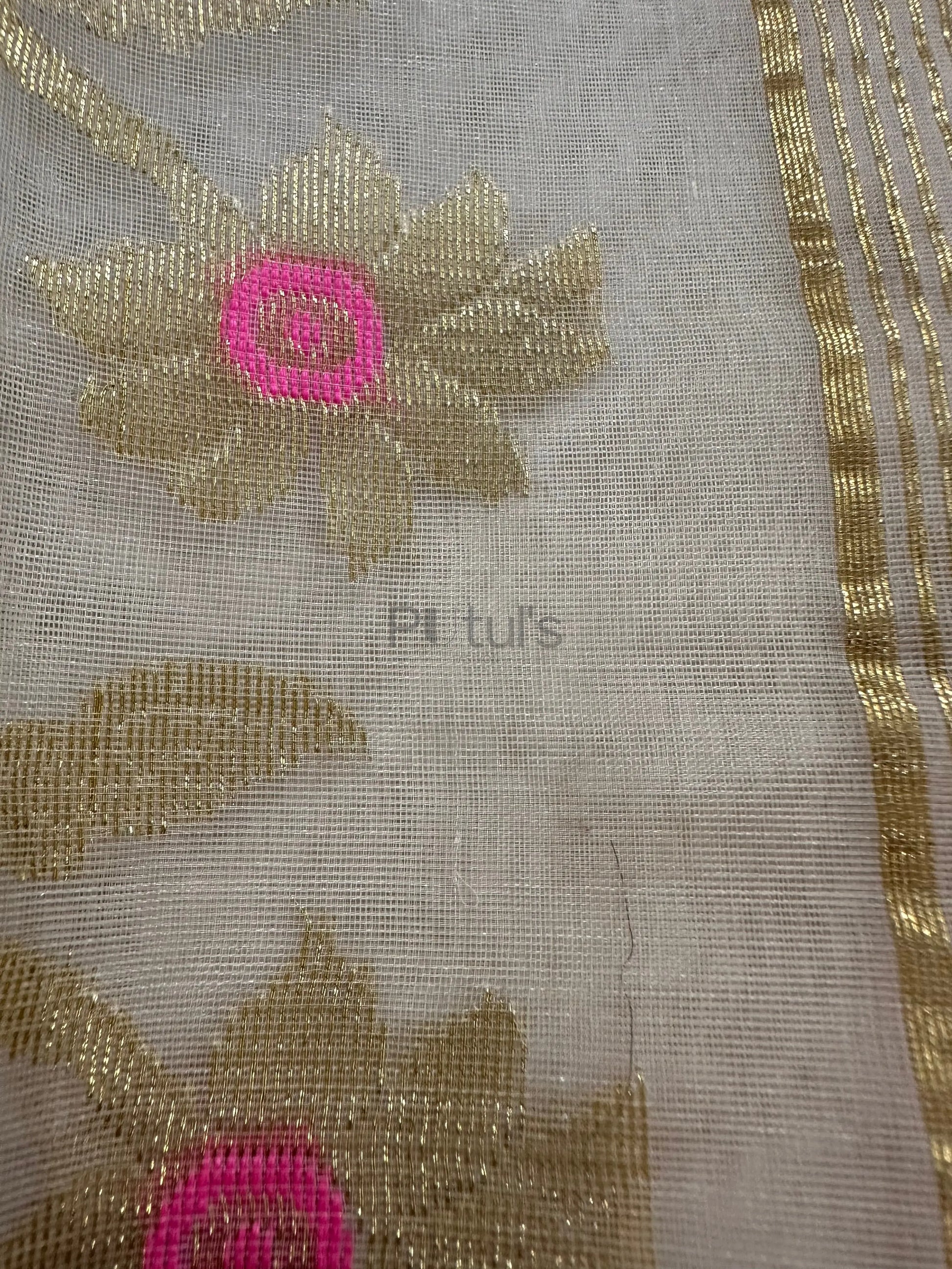 white coloured Muslin saree with pink minakari Putul's Fashion